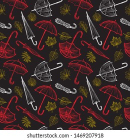Seamless pattern of sketches of umbrellas and fall leaves