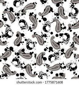 Seamless pattern of the skull and the paisley,