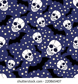 Seamless pattern with skulls and bat