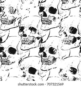 Seamless pattern with skulls. Black and white colors. Grunge stile. Repeating background. 