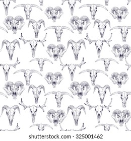 Seamless pattern with skulls of deer, bull, goat and sheep. Line drawing of skulls. Mystical background for your design.