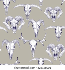 Seamless pattern with skulls of deer, bull, goat and sheep. Line drawing. Mystical background for your design.