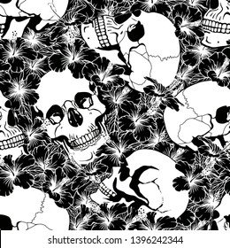 Seamless pattern with skulls and flowers