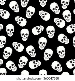seamless pattern skulls on a black background.Vector Illustration