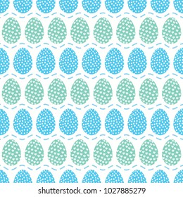 Seamless pattern of sky blue easter eggs with pattern of hearts and dots