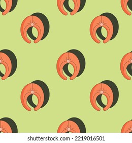 Seamless pattern with slice of salmon on green background. Vector illustration in the style of flat with broccoli and slice of red fish. Print for kitchen wallpaper.