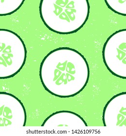 Seamless pattern with sliced cucumber - summer season vegetable. Close up drawing of cut cucumber. Green grunge backdrop. 