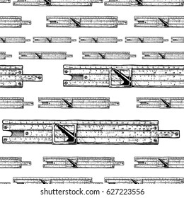 Seamless pattern with slide rules. Vector illustration in ink hand drawn style on white background.  