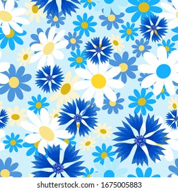 Seamless pattern with  small and big white daisies and blue cornflowers on a blue  background. Wild chamomile flowers.Summer vector illustration.Print for fabric,textile,wrapping paper.