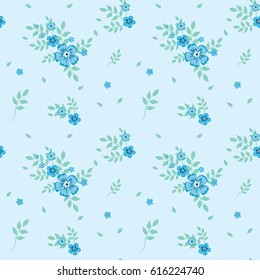 Seamless pattern in a small blue flower on a blue background.