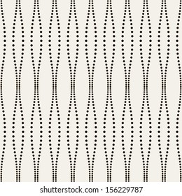 Seamless pattern with small circles. Vector fine texture. Stylish wavy background