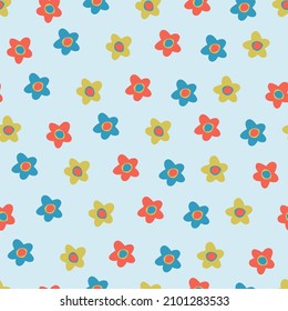 Seamless pattern with small colorful flowers in Ditsy style. Retro 60s, 70s design for gift wrap, textile, home decor