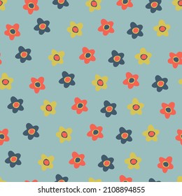 Seamless pattern with small colorful flowers in Ditsy style. Retro 60s, 70s design for gift wrap, textile, home decor