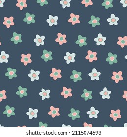 Seamless pattern with small colorful flowers in Ditsy style. Retro 60s, 70s design for gift wrap, textile, home decor