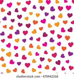 Seamless pattern with small colorful hearts on a white background. Vector repeating texture.