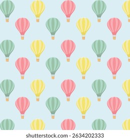 Seamless pattern of small colourful hot air balloons flying  on a blue background, vector illustration.