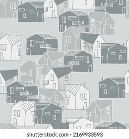 Seamless pattern with small detached, single-family houses on gray background for surface design and other design projects