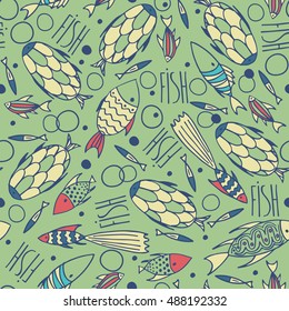 Seamless pattern with small different fishes in a chaotic manner on green background. Handmade cartoon style. Vector illustration