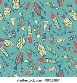 Seamless pattern with small different fishes in a chaotic manner on cyan background. Handmade cartoon style. Vector illustration