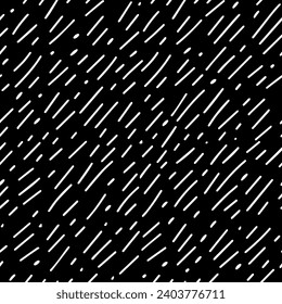 Seamless pattern with small dots or dashes.