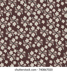 Seamless pattern with small flowers and twigs. Vintage, vintage style. Bright flowers on a brown background. To print on tissue paper.
