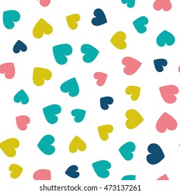 Seamless pattern with small hearts of fresh colors on a white background. Vector repeating texture.