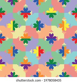 Seamless pattern of small and large four leaf clover symbols on checkered background in rainbow colours. Regularly repeating geometric flower shapes for themed prints and stationery. 