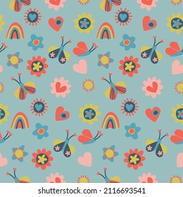 Seamless pattern with small multicolored flowers, hearts, butterflies, rainbows, sun. Retro 60s, 70s design for gift wrap, textile, home decor. Love, Valentines Day concept