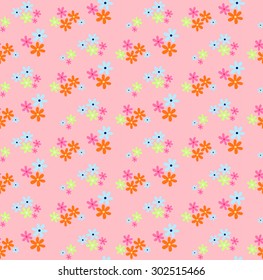 Seamless pattern of small multi-colored flowers looks lovely in sweet style, ideal for children or girls