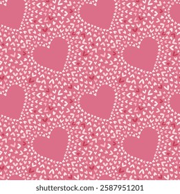 Seamless pattern with small pink and red hearts on a pink background. Cute doodle style Valentine's day vector illustration. Romantic print for greeting cards, scrapbooking, wrapping, textile, fabric