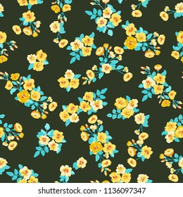 Seamless pattern in small pretty wild yellow flowers. Cute bouquets. Liberty style millefleurs. Floral background for textile, wallpaper,  covers, surface, print, wrap, scrapbooking, decoupage