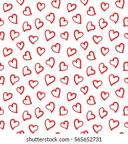 Seamless pattern with small red hand drawn hearts on the white background. Design for Saint Valentine's Day Cards.