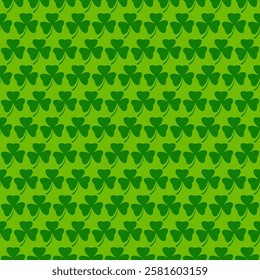 Seamless pattern of small shamrocks on green background for St. Patrick's Day
