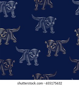 Seamless pattern with small striped kittens. Gold and silver cats on a dark blue background. Hand-drawn vector illustration. Line art.