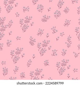 Seamless pattern with small, tiny wildflowers on an pink background.
