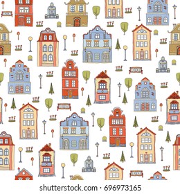 Seamless pattern with small town houses . Vector cute decorative background . 