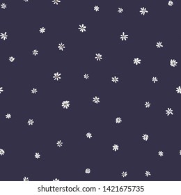 Seamless pattern of small white daisies on dark background