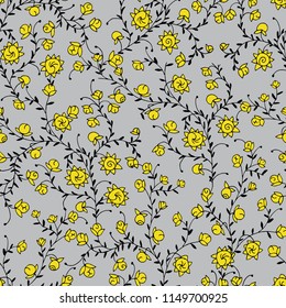 Seamless pattern with  small yellow flowers. Ditsy print