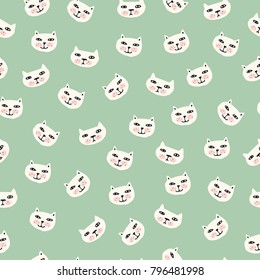 Seamless pattern with smiling cat faces and mint background. Modern design for fabric and paper, web page background, surface textures.