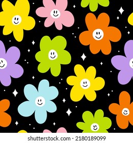 Seamless pattern with smiling colorful flowers on black background. Hand dran vector illustration. Texture for print, textile, fabric, packaging.