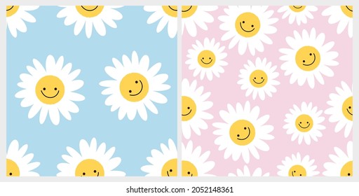 Seamless pattern with smiling daisy flower on blue and pink backgrounds vector illustration. Cute cartoon floral print.