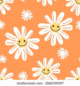 Seamless Pattern With Smiling Daisy Flower On Orange Background Vector Illustration. Cute Hand Drawn Positive Wallpaper.