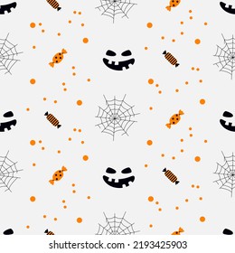 Seamless pattern with smiling faces of ghosts or Halloween pumpkins, cobweb and candies on an white  background. Vector illustration