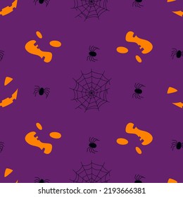 Seamless pattern with smiling faces of ghosts or Halloween pumpkins and spiders on a purple background. Vector illustration