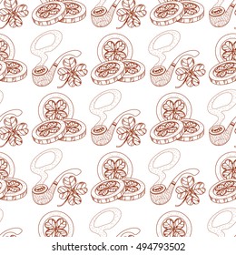 Seamless pattern with smoking pipe and coins with clover.