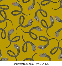 Seamless pattern with snakes on  colored  background