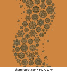 Seamless pattern. Snow flakes background. Snowflake vector design on orange background.