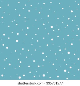 Seamless pattern with snow flakes on a blue background