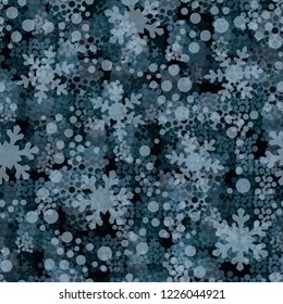 Seamless pattern. snowflakes among the round spots and winter camouflage.