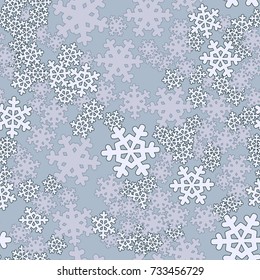 Seamless pattern. Snowflakes are arranged in random order.